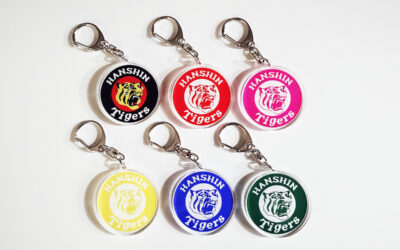 【プレスリリース】JR西日本　立花駅にガチャ自販機が登場！12/25からタイガースアクリルキーホルダー販売開始